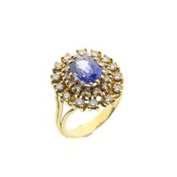 Gold cocktail ring with sapphire and diamonds; 0.70 ct.