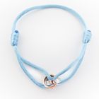 Image 4 of Bracelet made of light blue satin cord with two-tone gold rings; Løve