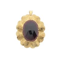 Vintage gold pendant/brooch with garnet