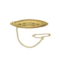 Gold brooch with Zeeland buttons