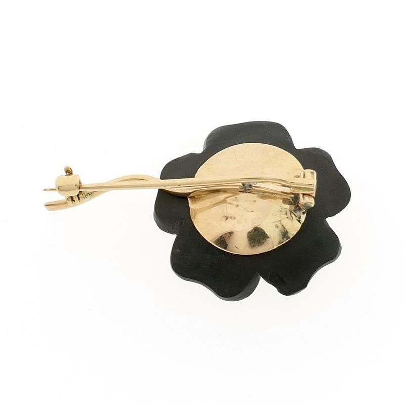 Image 6 of Gold flower brooch with onyx and diamond | 0.60 ct.