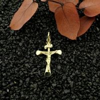 Gold pendant of a cross with corpus; INRI