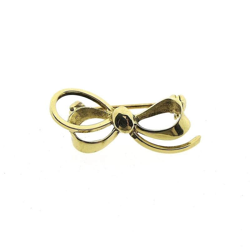 Image 1 of Gold brooch as a bow