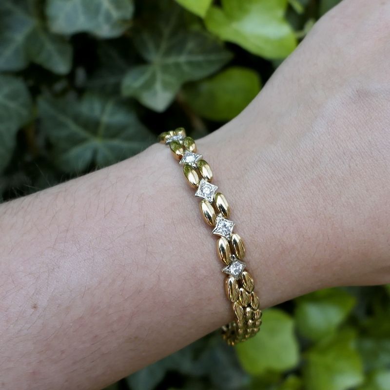 Image 13 of Gold Bismarck link bracelet with 0.4 ct diamond.