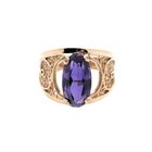 Image 7 of Vintage rose gold ring set with a synthetic purple gemstone.