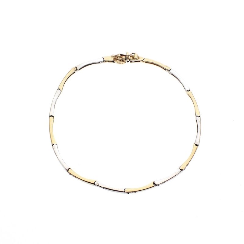 Image 1 of Two-tone gold fantasy link bracelet with zirconia.