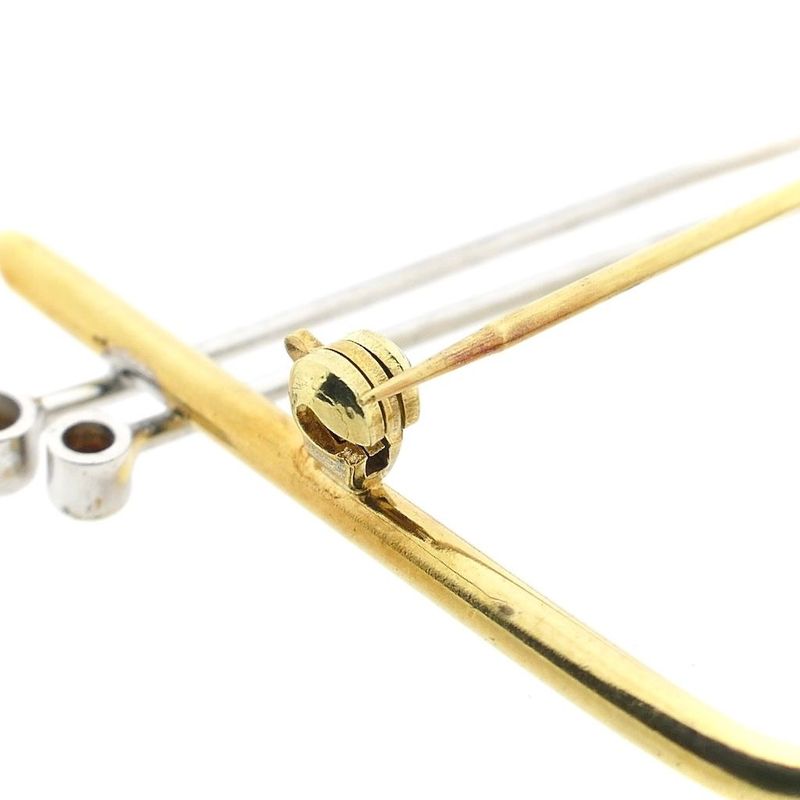 Image 6 of Two-tone gold dynamic brooch with zirconia