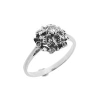 Antique white gold entourage ring with 0.10 ct diamond.