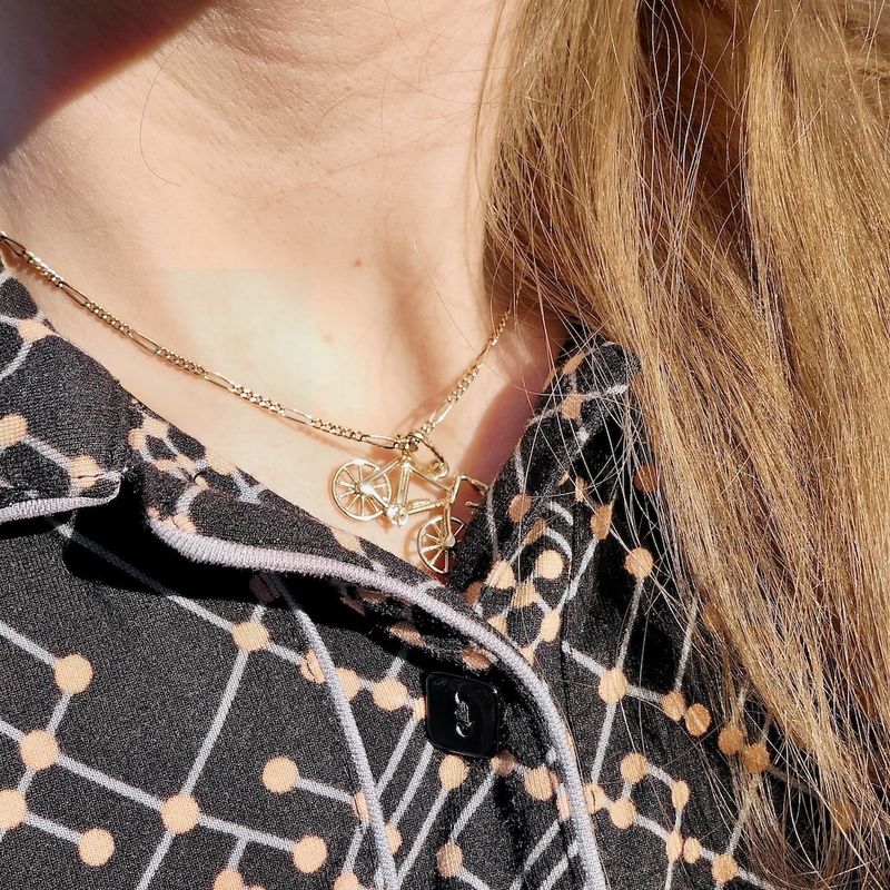 Image 4 of Gold pendant of a racing bicycle