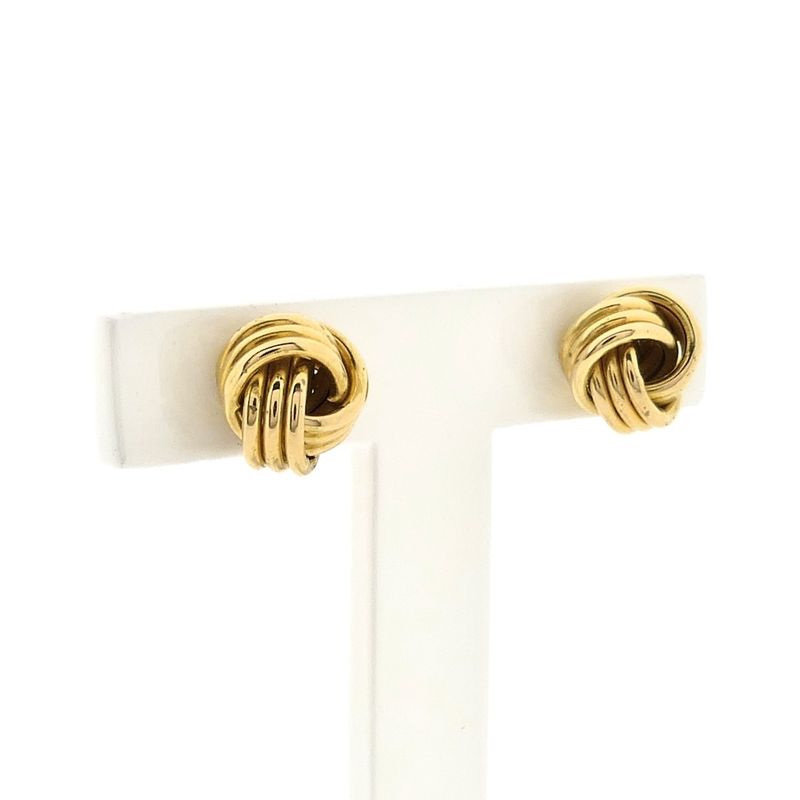 Image 4 of Gold stud earrings as a button