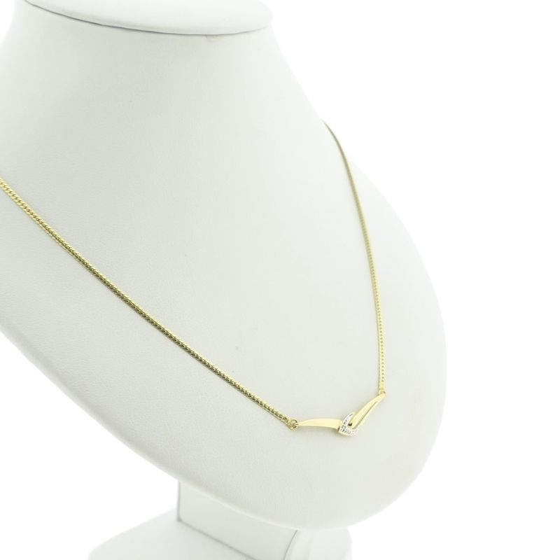 Image 1 of Gold necklace with fixed pendant and diamond; 0.005 ct.