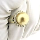 Image 10 of 18-karat gold cocktail ring with sea pearl and 1.10 ct diamond.