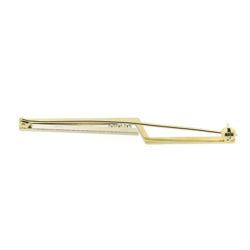Image 11 of Two-tone gold long narrow brooch with diamonds; 0.15 ct.