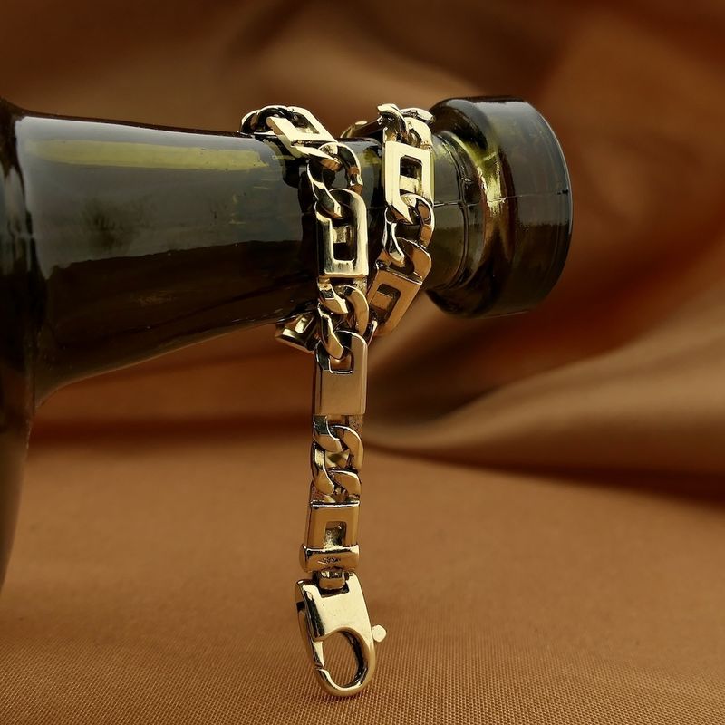 Image 2 of Two-tone gold figaro link bracelet