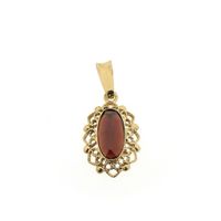 Vintage gold pendant with garnet