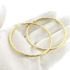 Image 7 of Gold twisted earrings | Ø 54.5 mm