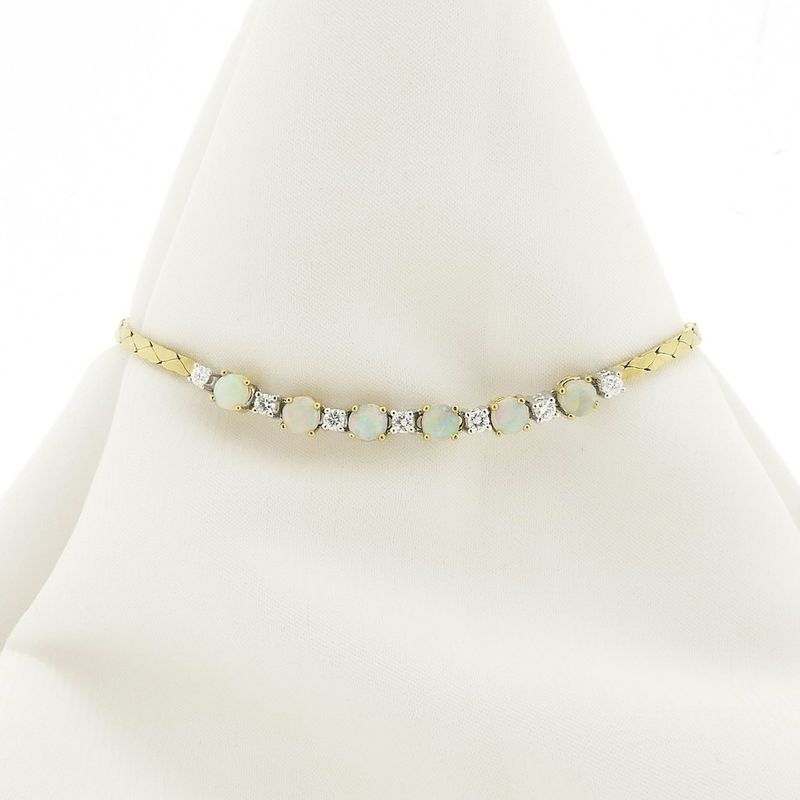 Image 1 of Gold cobra link bracelet with opal and diamond; 0.24 ct. | 17 cm