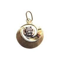 Two-tone gold circular pendant with diamond; 0.05 ct.
