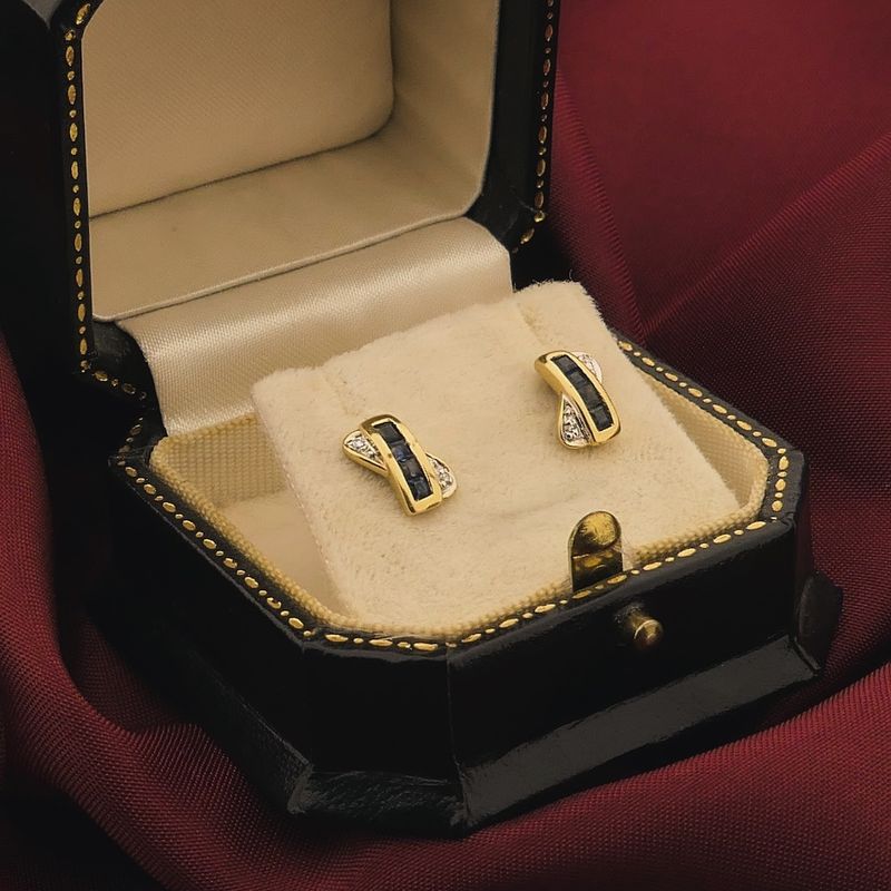 Image 2 of Gold stud earrings with sapphire and diamond | 0.02 ct.