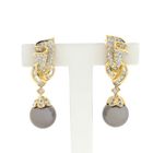 Image 1 of Gold stud earrings with Tahiti pearl and diamonds; 1.36 ct.