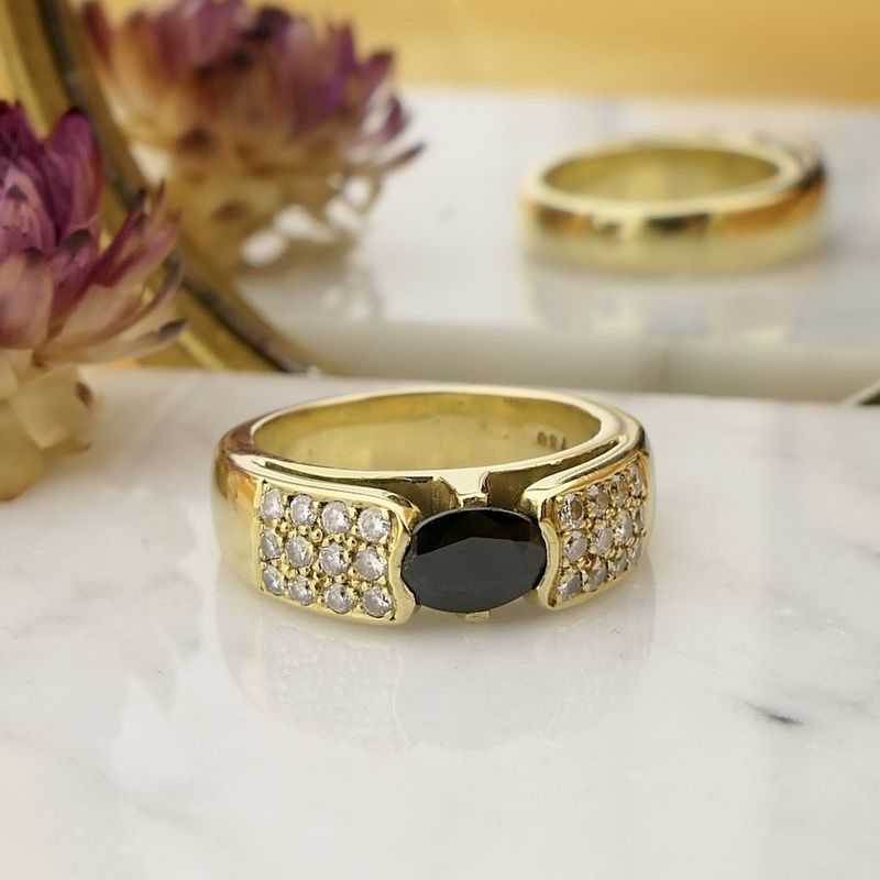 Image 2 of Gold ring with sapphire and diamond; 0.48 ct.