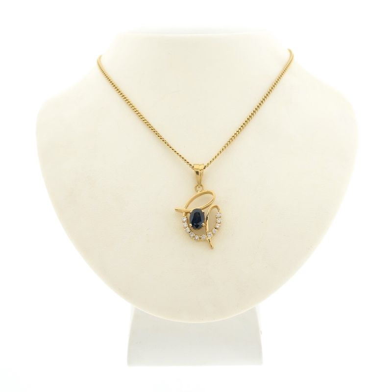 Image 5 of Gold pendant with sapphire and diamond 0.33 ct.