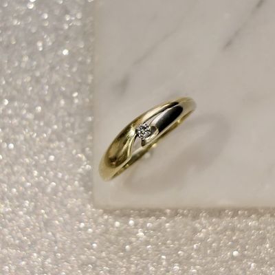 Image 2 of Two-tone gold solitaire ring with diamond; 0.04 ct.