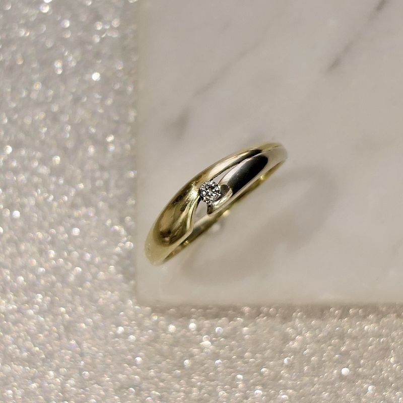 Image 2 of Two-tone gold solitaire ring with diamond; 0.04 ct.