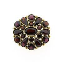 Vintage gold brooch with garnet