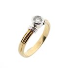 Image 1 of 18-karat bicolor solitaire ring with 0.20 ct. diamond