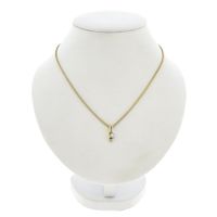 Two-tone gold necklace with fixed pendant and diamond; 0.10 ct.