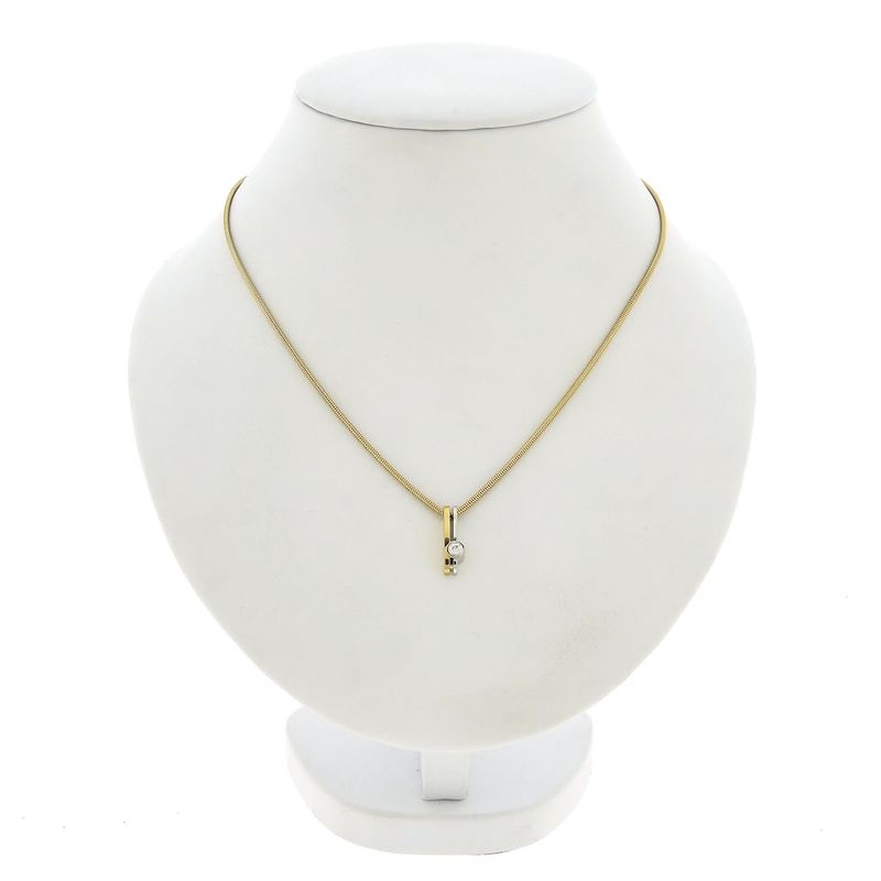 Image 1 of Two-tone gold necklace with fixed pendant and diamond; 0.10 ct.