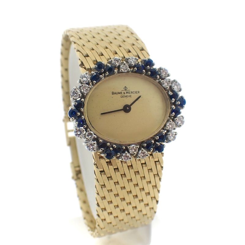 Image 15 of Baume Mercier Vintage; 14k. gouden horloge met briljanten en saffier