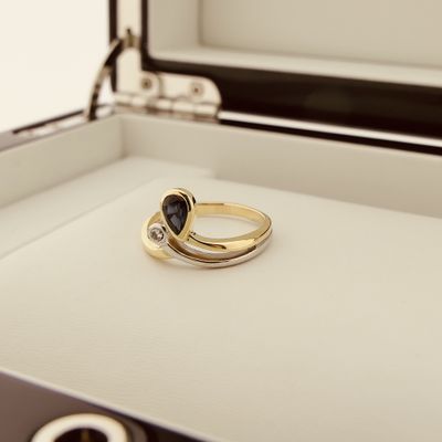 Image 2 of Two-tone gold ring with sapphire and diamond | 0.03 ct.