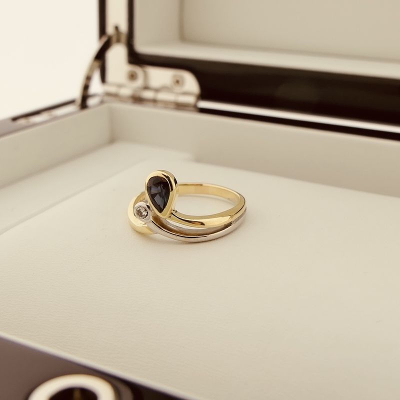 Image 2 of Two-tone gold ring with sapphire and diamond | 0.03 ct.