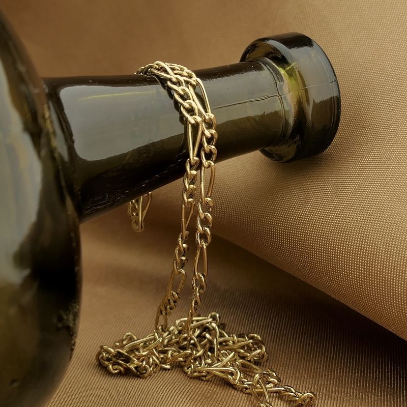 Image 2 of Gold Figaro link chain | 61 cm