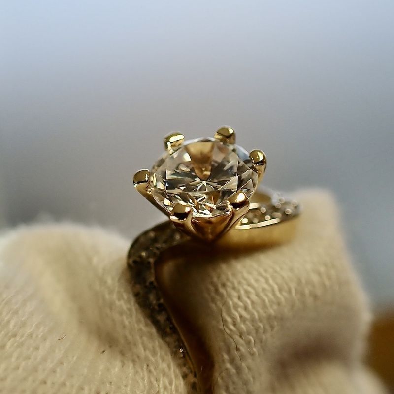 Image 2 of 18 carat gold cocktail ring set with zirconia