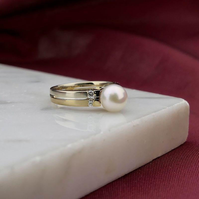 Image 2 of Two-tone gold ring with pearl and diamonds; 0.06 ct.