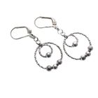 Image 1 of Silver earrings with two rings and balls | Ø 18 mm