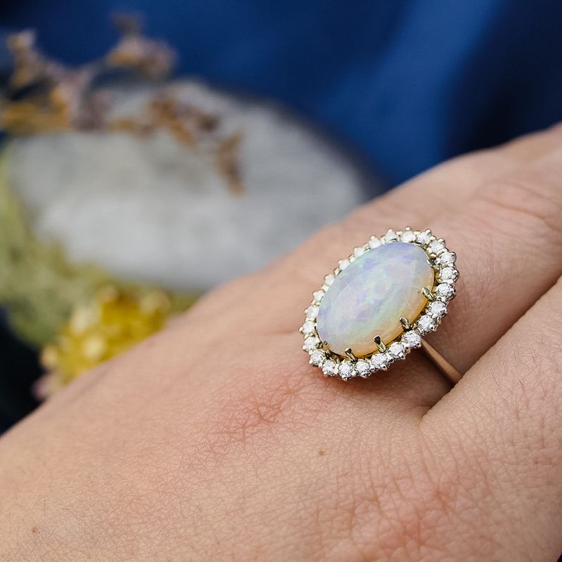 Image 6 of 18-karat white gold ring with opal and entourage of diamonds | 0.60 ct.