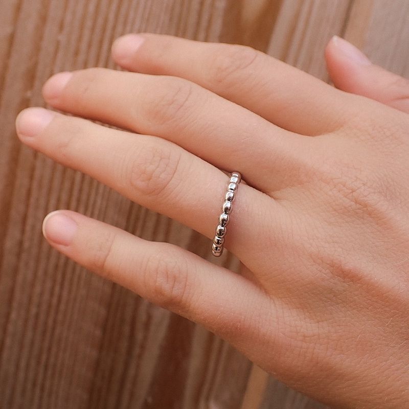 Image 4 of White gold sliding ring with balls