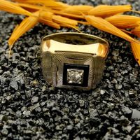 Gold men's signet ring with onyx and zirconia