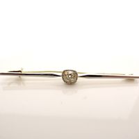Vintage white gold long narrow brooch with moissanite