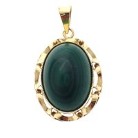 Vintage gold pendant with malachite