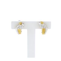Bicolor gold fantasy stud earrings with diamonds; 0.15 ct.