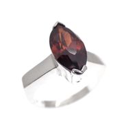 Silver solitaire ring with red zirconia