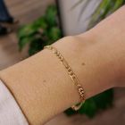 Image 4 of Gold closed Figaro link bracelet.