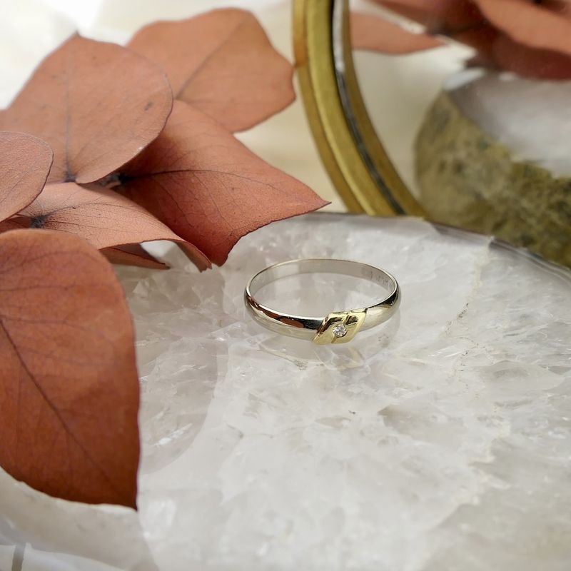 Image 2 of 18-karat bicolor solitaire ring with 0.01 ct. diamond