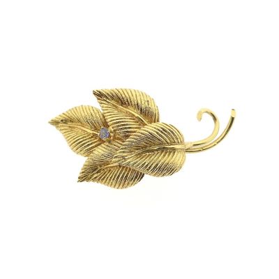 Image 1 of Gold brooch of leaves with sapphire
