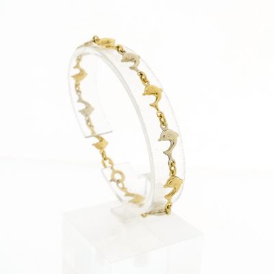 Image 1 of Two-tone gold dolphin bracelet